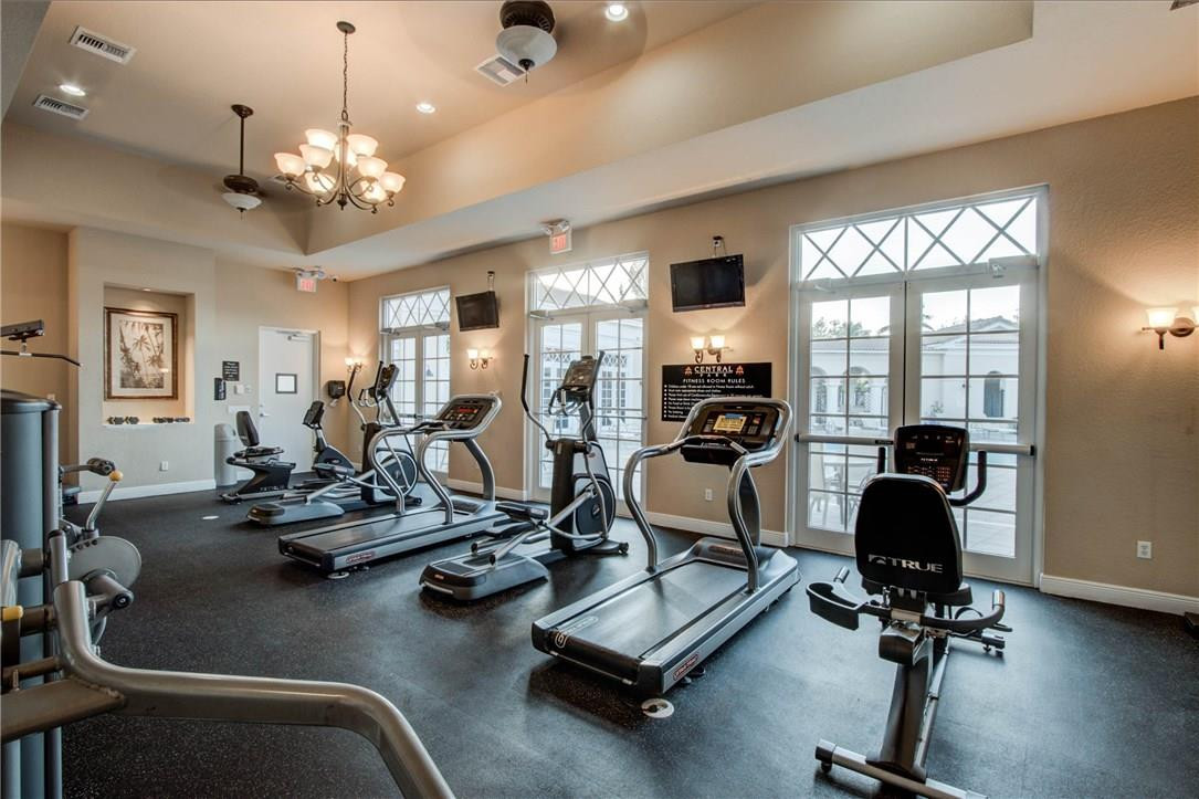 815 Northwest 82nd Place, Unit 815 Boca Raton, FL 33487 - Photo 5 of 5 a view of a room with gym equipment