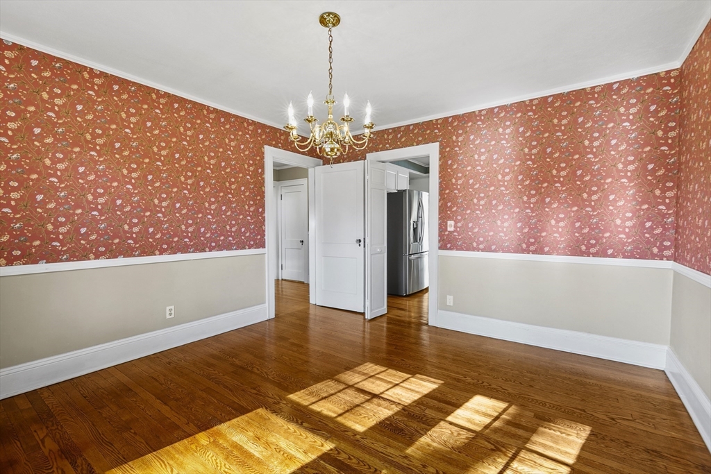 54 Chatham Road Longmeadow, MA 01106 - Photo 13 of 42 a view of an empty room with window and wooden floor
