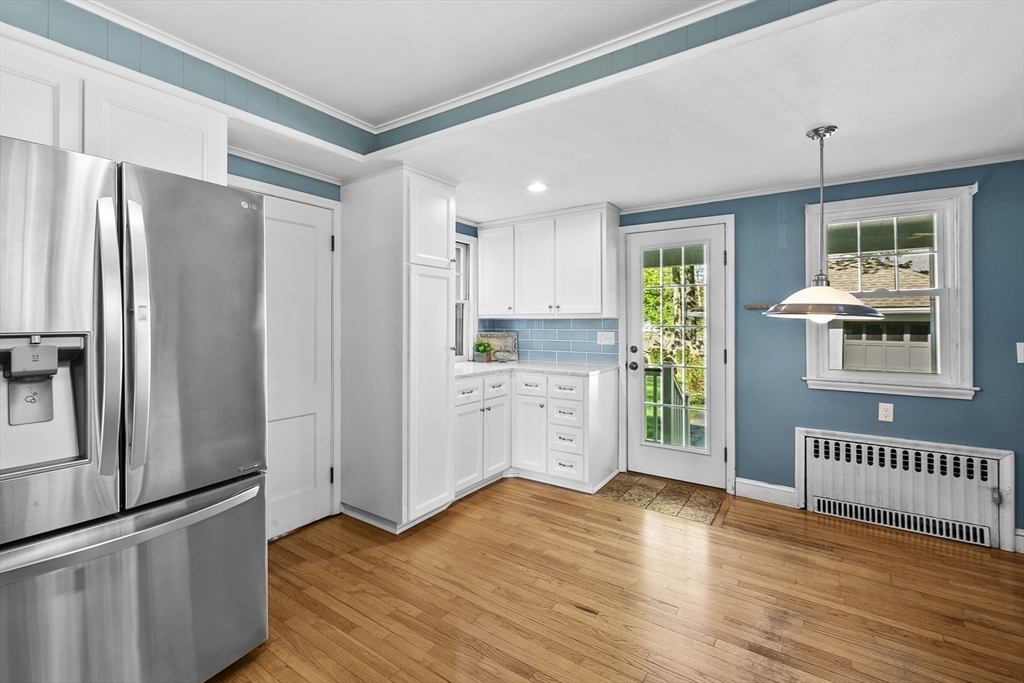 54 Chatham Road Longmeadow, MA 01106 - Photo 17 of 42 a kitchen with stainless steel appliances a refrigerator and a stove top oven