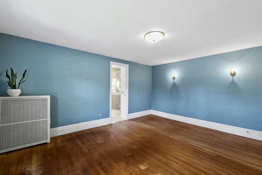 54 Chatham Road Longmeadow, MA 01106 - Photo 24 of 42 a view of a room with wooden floor and plant