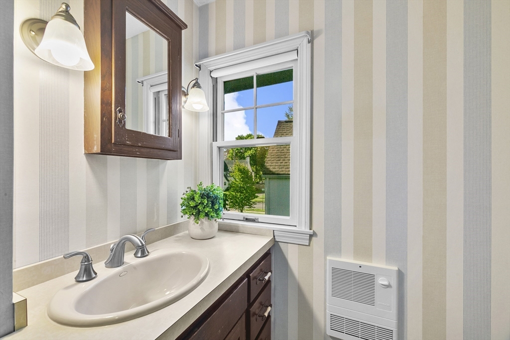 54 Chatham Road Longmeadow, MA 01106 - Photo 26 of 42 a bathroom with a sink and a mirror