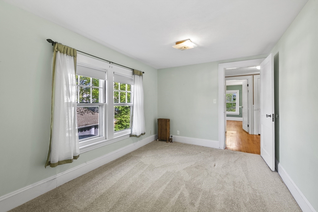 54 Chatham Road Longmeadow, MA 01106 - Photo 32 of 42 wooden floor in an empty room with a window