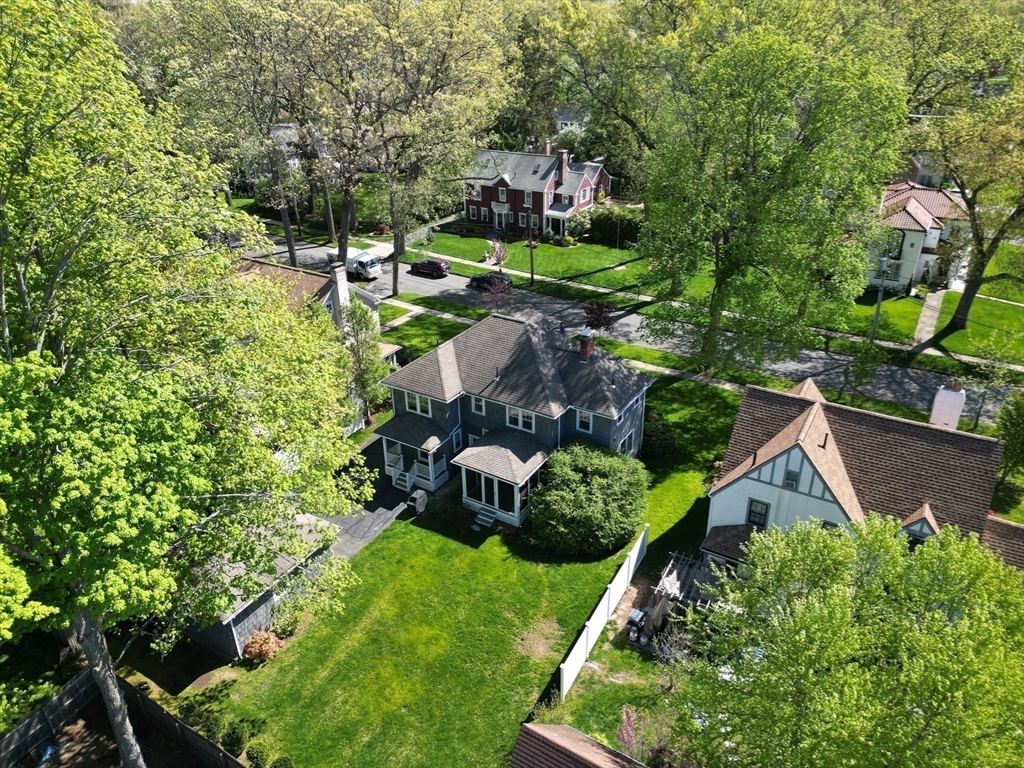 54 Chatham Road Longmeadow, MA 01106 - Photo 40 of 42 an aerial view of a house with a yard and outdoor seating