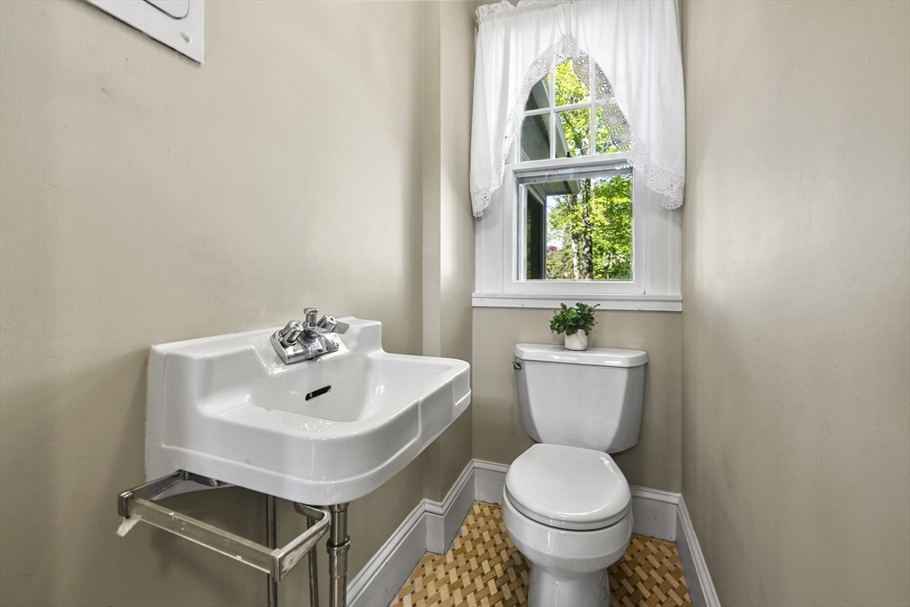 54 Chatham Road Longmeadow, MA 01106 - Photo 10 of 42 a bathroom with a sink a toilet and a window