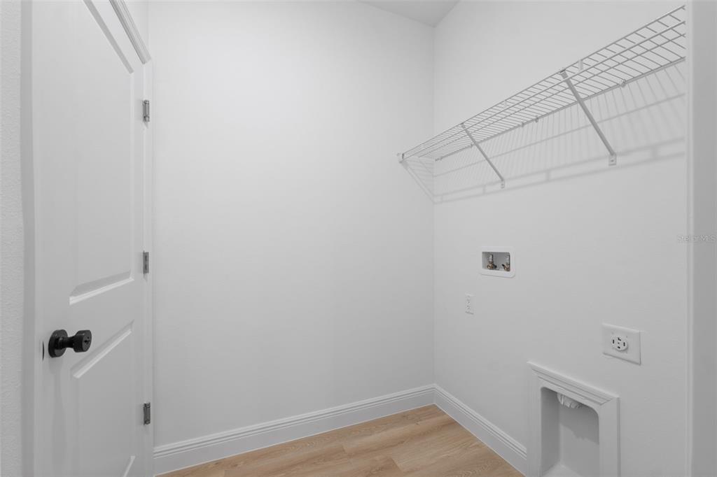 15775 Southwest 46th Circle Ocala, FL 34473 - Photo 30 of 35 a view of a room with racks on the wall