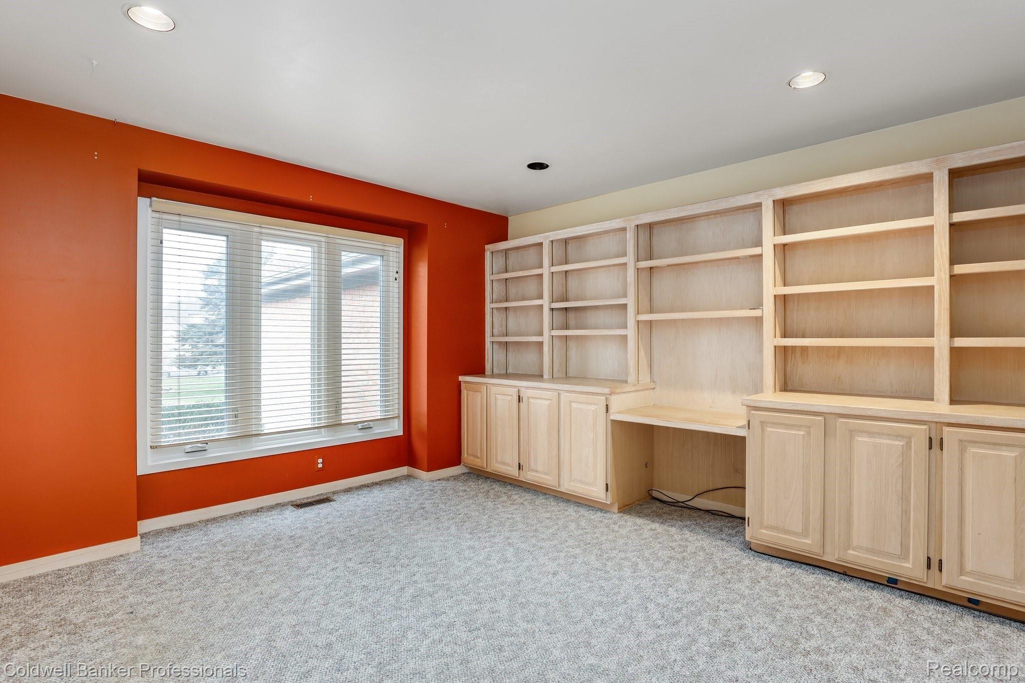 5365 Ridge Trail North Clarkston, MI 48348 - Photo 18 of 55 Built in bookshelves and storage makes this a great office space!