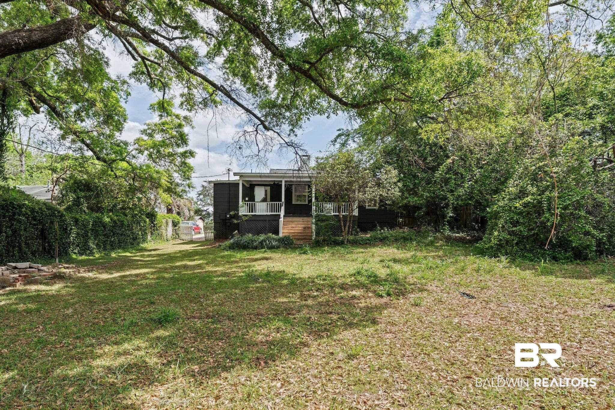 41 Hathaway Road West Mobile, AL 36608 - Photo 19 of 24 Rear view of property with covered porch