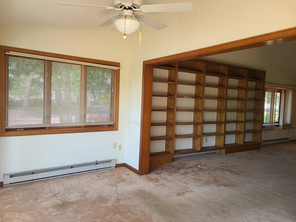 174 Lowell Road, Unit 62 Mashpee, MA 02649 - Photo 16 of 30 an empty room with windows