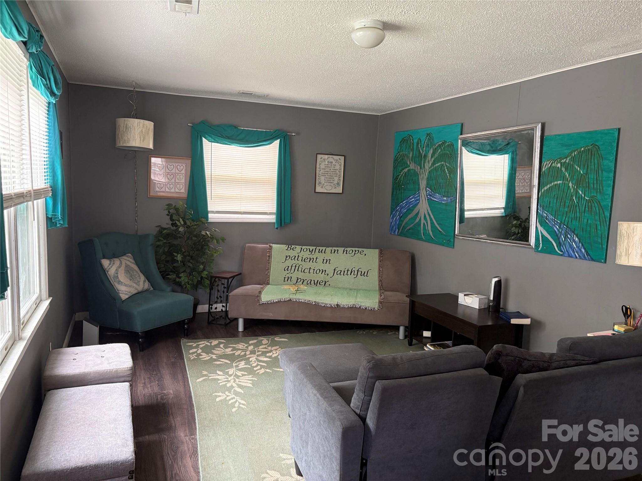 111 Magnolia Lane Lancaster, SC 29720 - Photo 2 of 8 a living room with furniture and a large window