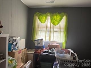 111 Magnolia Lane Lancaster, SC 29720 - Photo 6 of 8 a bed sitting in a bedroom next to a window