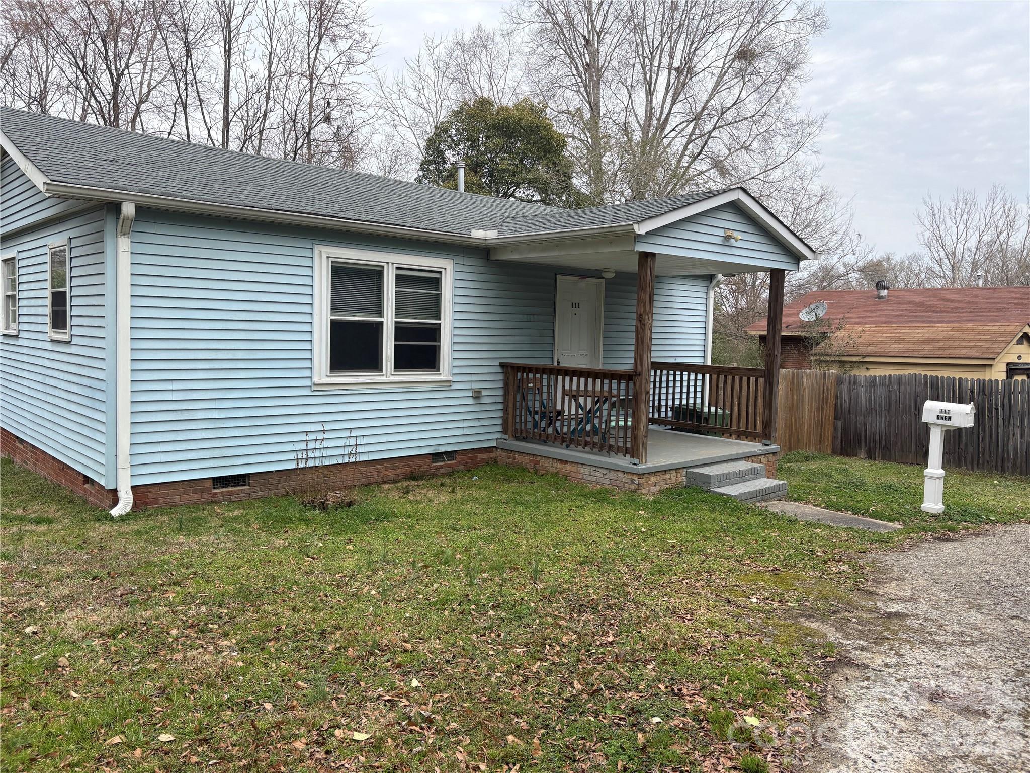 111 Magnolia Lane Lancaster, SC 29720 - Photo 7 of 8 a view of a house with a yard