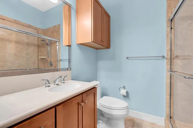an aerial view of a house with yard swimming pool and outdoor seating