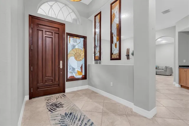 a kitchen with stainless steel appliances granite countertop a stove and a sink