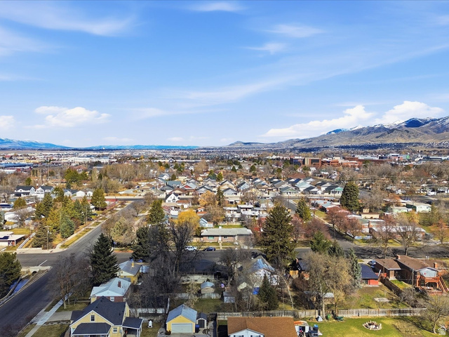 322 East 900 North Logan, UT 84321 - Photo 39 of 43 Aerial view of residential area with a mountain backdrop