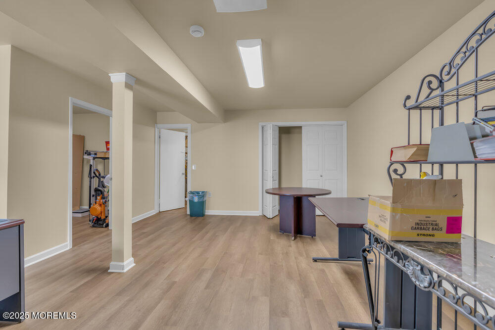 32 Pine Tree Drive Bayville, NJ 08721 - Photo 19 of 63 a view of a livingroom with furniture and hardwood floor