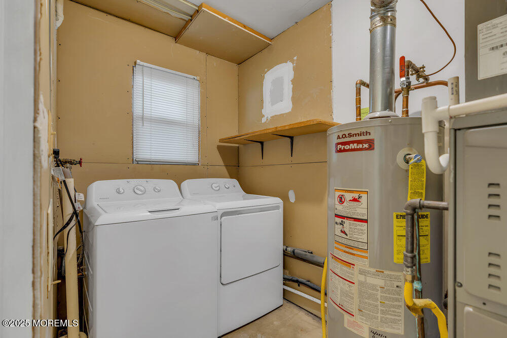 32 Pine Tree Drive Bayville, NJ 08721 - Photo 20 of 63 a utility room with dryer and washer