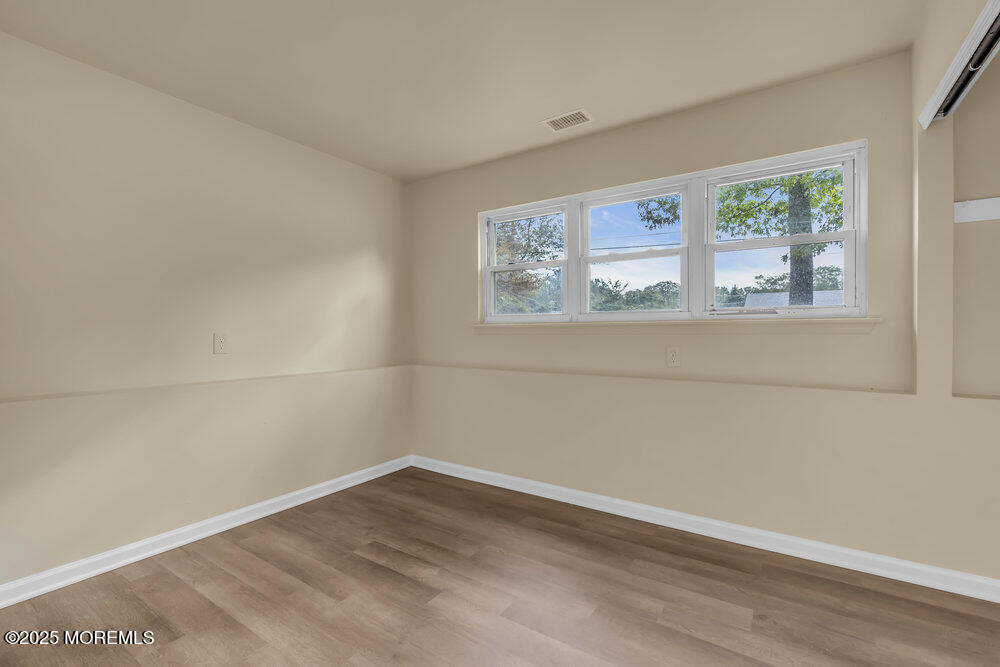 32 Pine Tree Drive Bayville, NJ 08721 - Photo 26 of 63 an empty room with a window