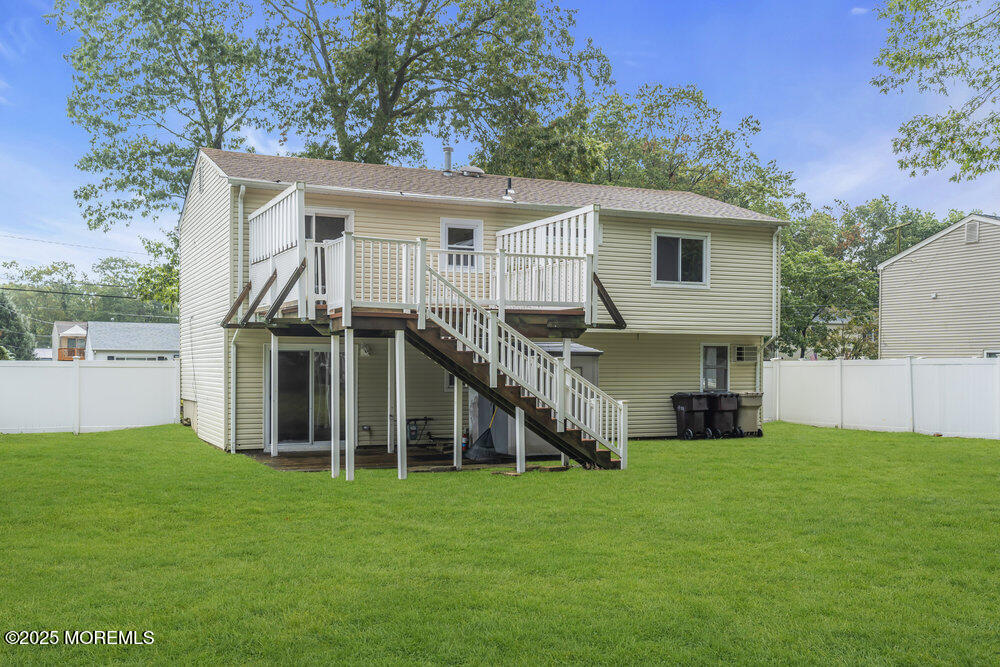 32 Pine Tree Drive Bayville, NJ 08721 - Photo 41 of 63 a view of a house with a yard and sitting area
