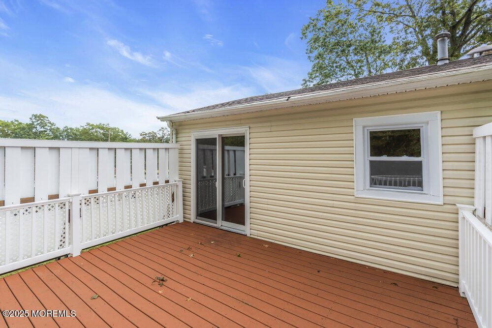 32 Pine Tree Drive Bayville, NJ 08721 - Photo 45 of 63 a view of a house with wooden floor
