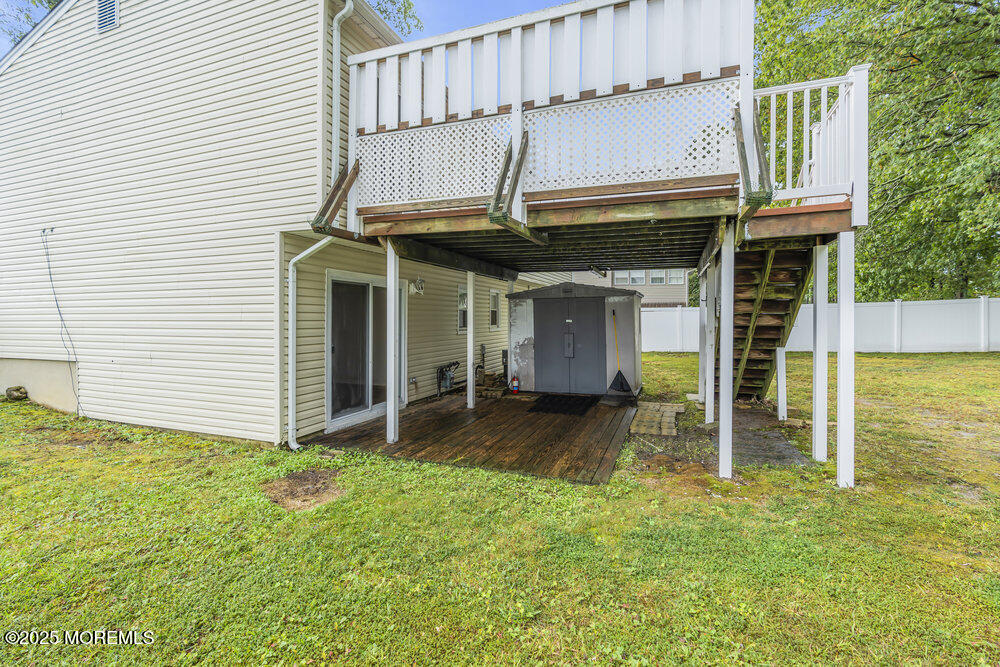 32 Pine Tree Drive Bayville, NJ 08721 - Photo 49 of 63 a view of a house with a porch