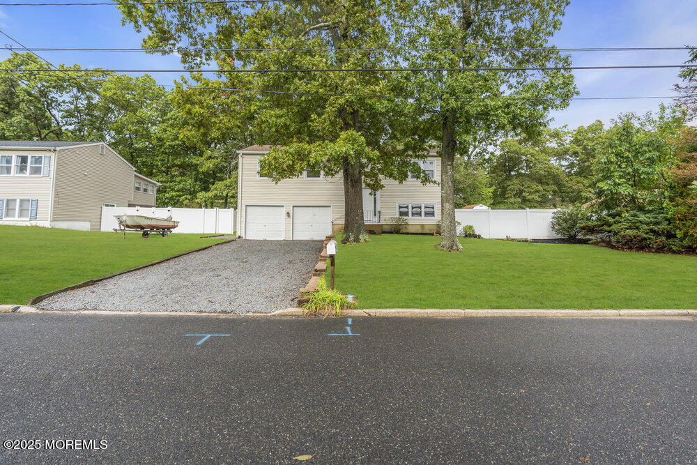 32 Pine Tree Drive Bayville, NJ 08721 - Photo 6 of 63 a view of a house with a big yard