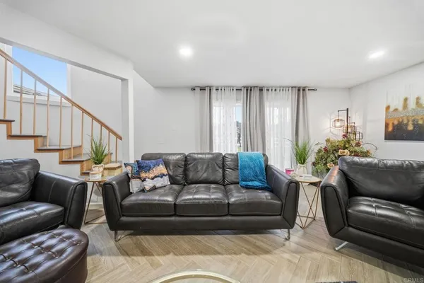 a bedroom with a bed and flat screen tv