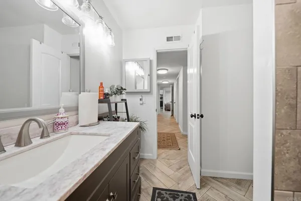 a view of kitchen with furniture and a window