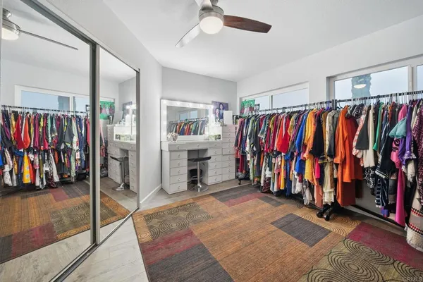 a view of an empty room with stairs