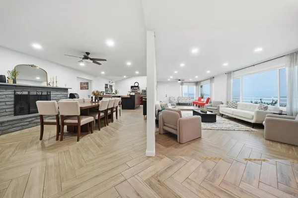 a large kitchen with stainless steel appliances lots of counter top space