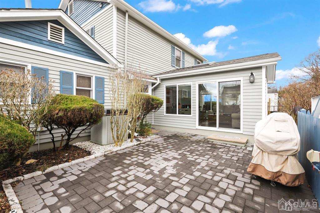 10 Bennett Road Old Bridge, NJ 07747 - Photo 25 of 35 a view of a house with backyard sitting area and garden