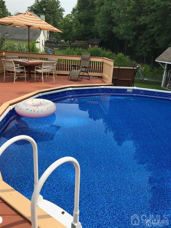 10 Bennett Road Old Bridge, NJ 07747 - Photo 28 of 35 swimming pool view with a seating space