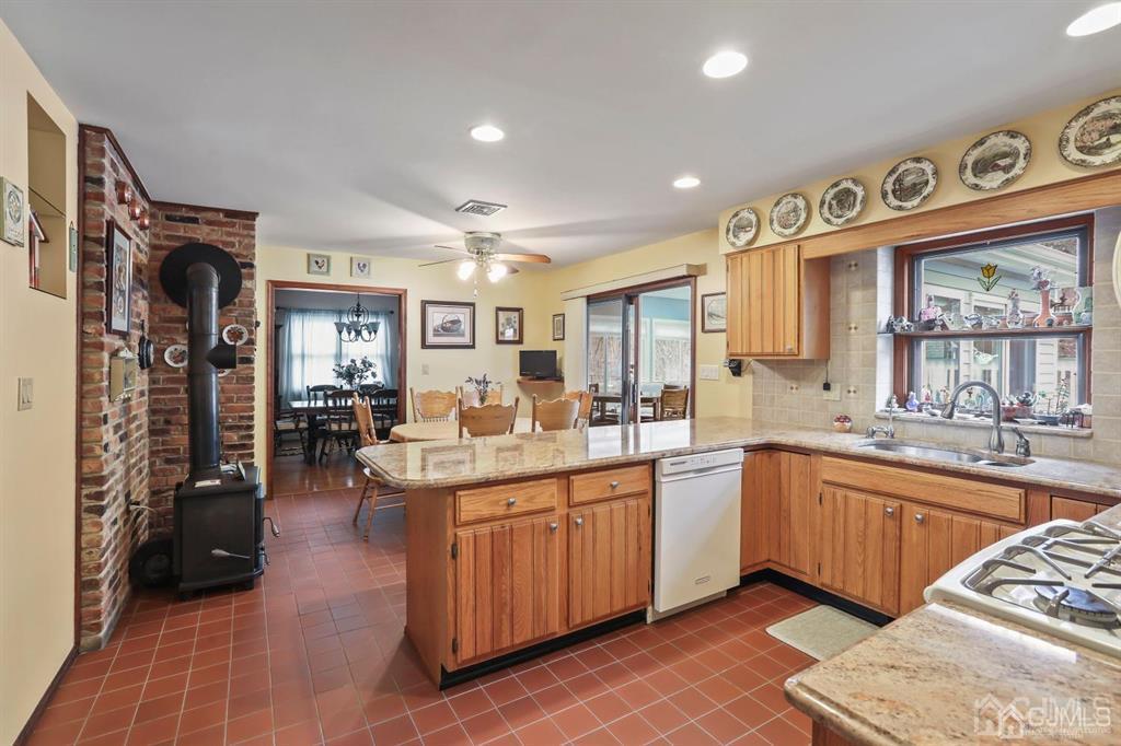 10 Bennett Road Old Bridge, NJ 07747 - Photo 8 of 35 a large white kitchen with a large window