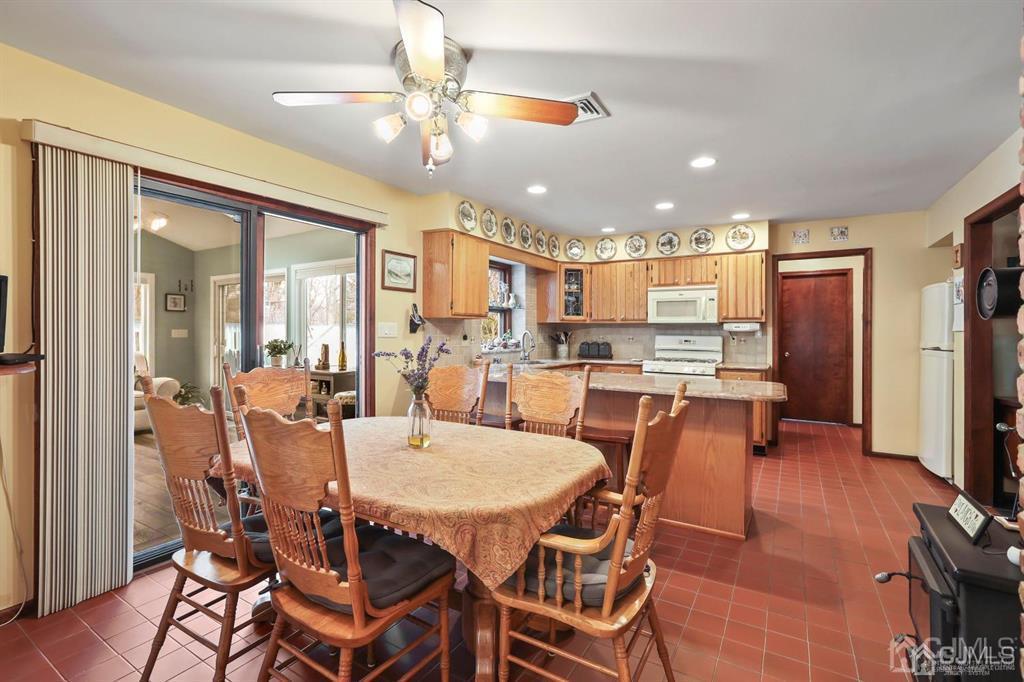 10 Bennett Road Old Bridge, NJ 07747 - Photo 10 of 35 a view of a dining room with furniture
