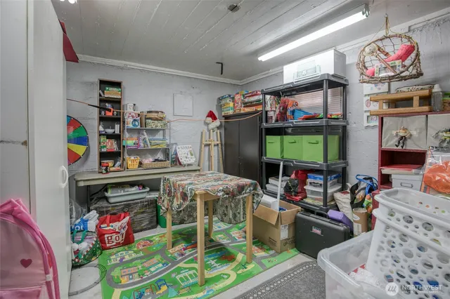 a room with lots of furniture and clutter