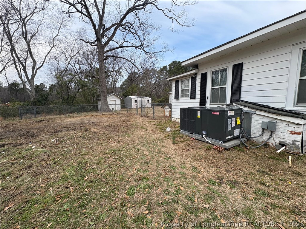 3174 Lindsay Road Raeford, NC 28376 - Photo 28 of 28 a view of a house with a yard