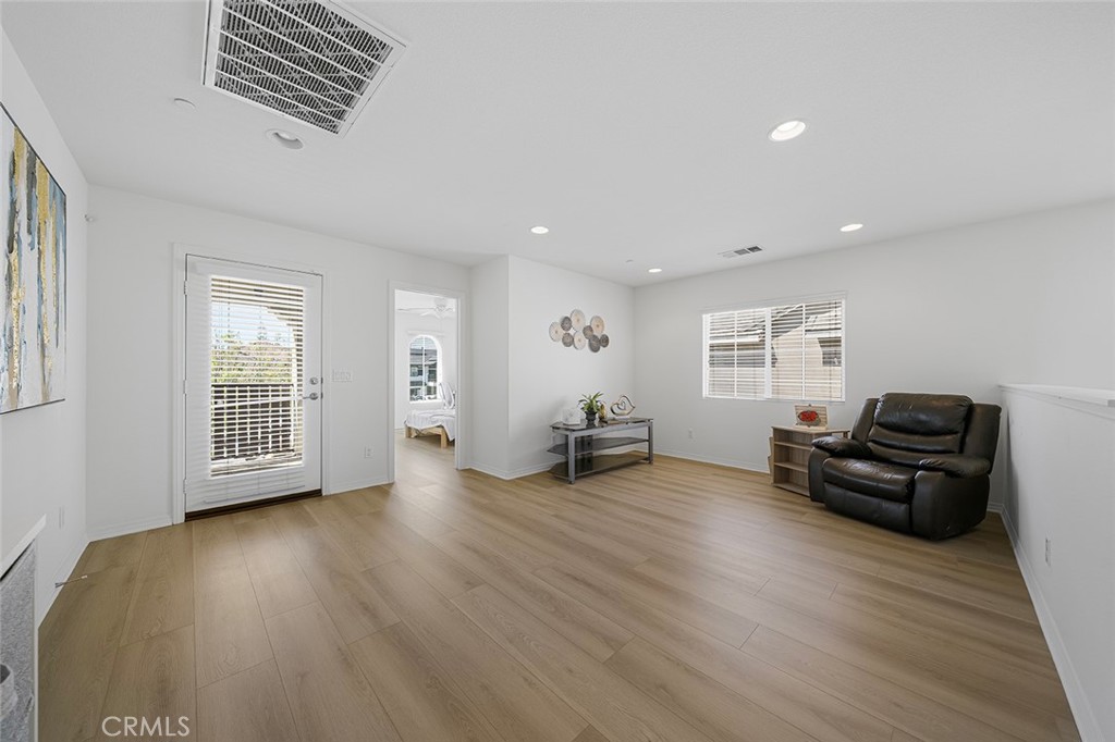12936 Canopy Court Rancho Cucamonga, CA 91739 - Photo 15 of 30 a view of a livingroom with furniture and a window