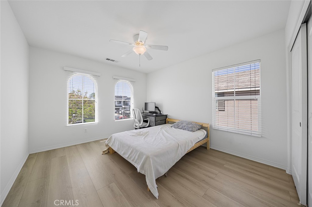 12936 Canopy Court Rancho Cucamonga, CA 91739 - Photo 17 of 30 a bedroom with a bed and a window