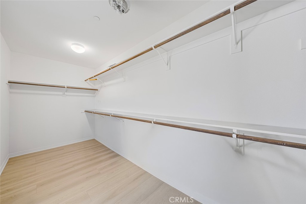 12936 Canopy Court Rancho Cucamonga, CA 91739 - Photo 23 of 30 a view of small space with racks on the wall