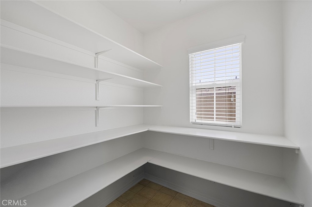 12936 Canopy Court Rancho Cucamonga, CA 91739 - Photo 25 of 30 a view of an empty room with a window