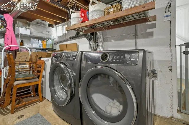 a utility room with dryer and washer