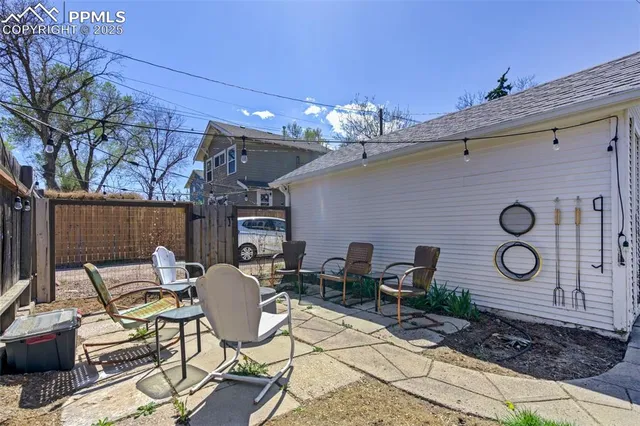 a view of a chairs and tables in patio