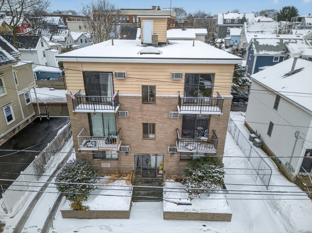 10-16 Stephen Street, Unit 5 Lynn, MA 01902 - Photo 18 of 26 a view of a white building among the street