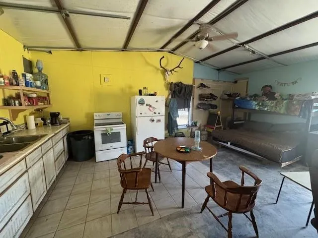 a outdoor dining space with furniture