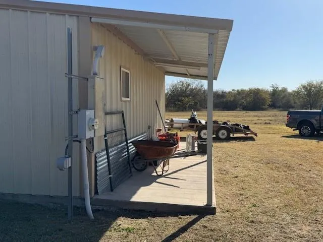 a view of living room filled with furniture and a table
