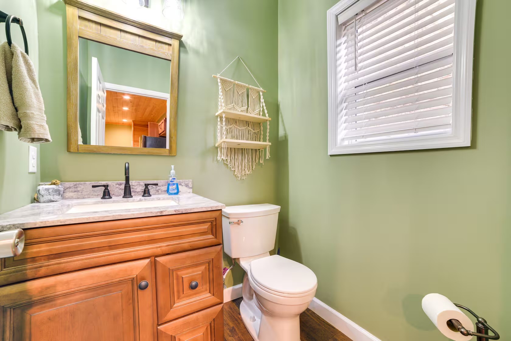3010 Highwater Road Waverly, TN 37185 - Photo 20 of 29 a bathroom with a toilet sink and mirror