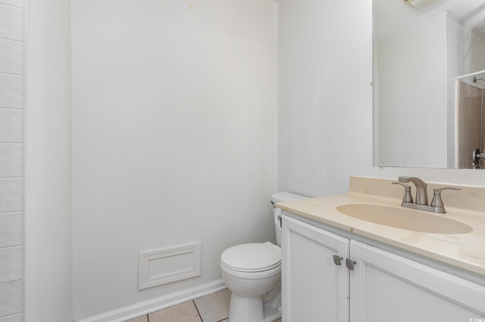 1830 Fairway Ridge Drive, Unit 6D Surfside Beach, SC 29575 - Photo 25 of 35 Bathroom with vanity, toilet, standup shower and t