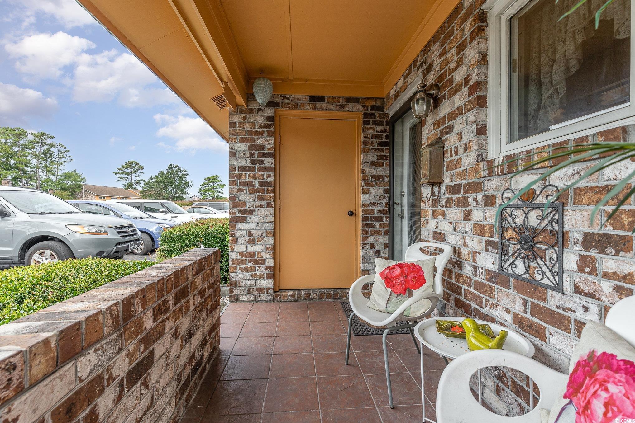 1830 Fairway Ridge Drive, Unit 6D Surfside Beach, SC 29575 - Photo 30 of 35 Covered front porch
