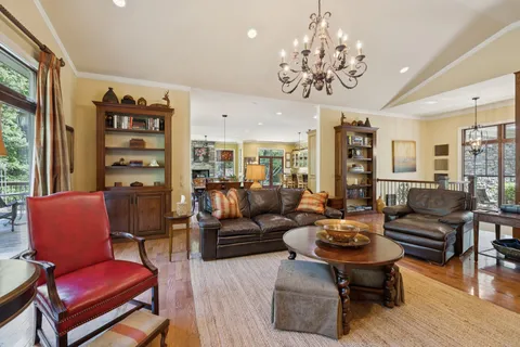 a kitchen with stainless steel appliances granite countertop a stove and a refrigerator