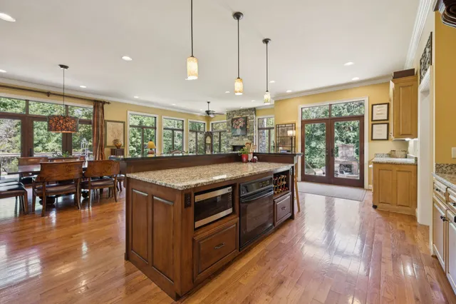 a bedroom with a bed and a chair