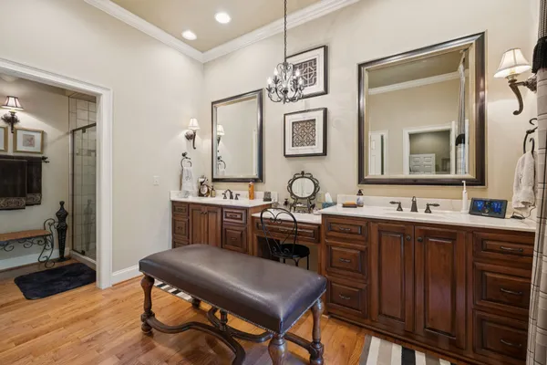 a view of a livingroom with furniture and hardwood floor
